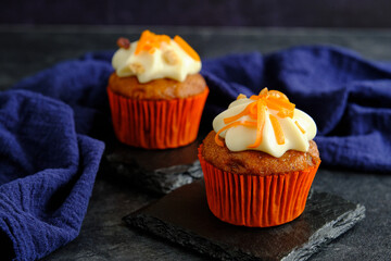 carrot cakes in close-up on a dark background