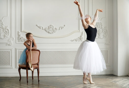 little ballerina looks at an adult ballerina and dreams. Student teacher mentor experience