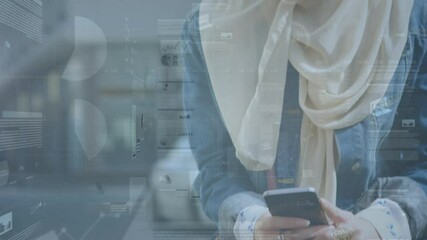 Animation of financial data processing over woman in hijab using smartphone - Powered by Adobe