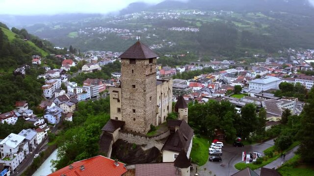 Village of Landeck in Austria with Landeck Castle - aerial view
