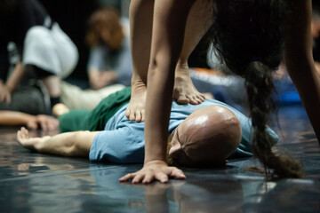 dancer recieve bodywork jr massage laying on the floor