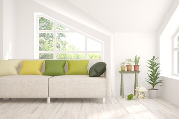 White living room with sofa and summer landscape in window. Scandinavian interior design. 3D illustration