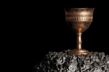 Old chalice over the stone and black background. 3D Render
