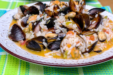 Cooked rice risotto with mussels and shrimps