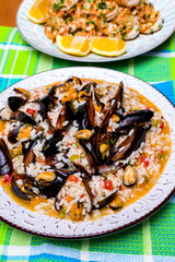 Cooked rice risotto with mussels and shrimps