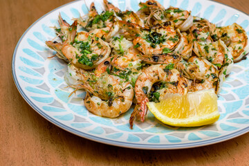 Fresh grilled shrimps served on a plate