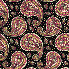 Luxury pattern with paisley ornamental design in golden and pink colors on black background. Weamless for wallpaper, textile design and wrapping paper print.