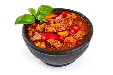 Hungarian goulash, pork stew, isolated on white background. - obrazy, fototapety, plakaty