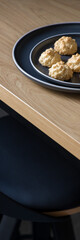 Close-up on cookies on plate, vertical panorama