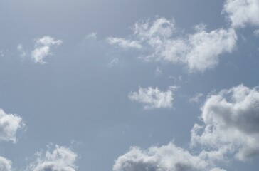 White clouds in the soft blue sky