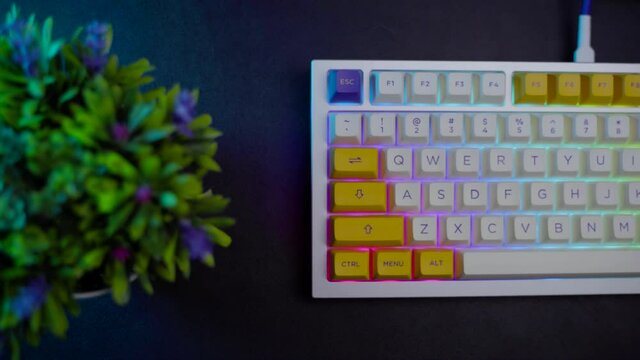 footage of a premium custom keyboard build kit with full alluminium base and bright RGB LED Colors