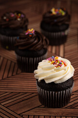 Closeup go fresh homemade chocolate cupcakes