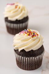 Closeup go fresh homemade chocolate cupcakes