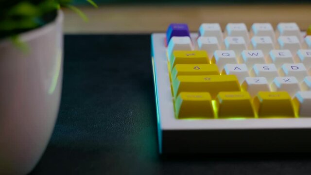footage of a premium custom keyboard build kit with full alluminium base and bright RGB LED Colors