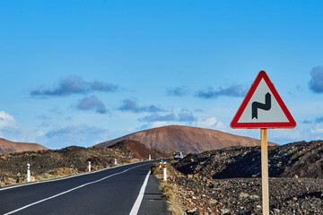 Warning sign near countryside road