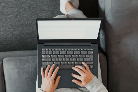 woman typing on latop