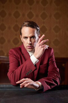 Thoughtful male actor looking at camera