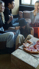 Group of teenagers get pizza after a long dance practice