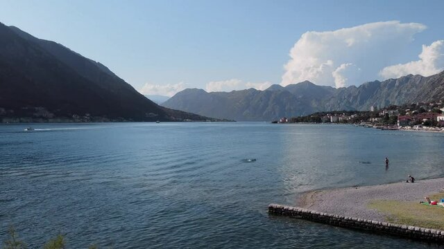 Kotor Bay aerial shot. Sea, mountains, beach and Dobrota