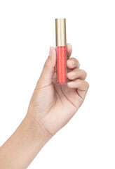 Hand holding Lipstick in bottle with gold lid isolated on white background