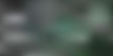 Dark green vector blur backdrop.