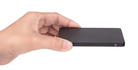 Hand holding External harddisk SSD isolated on white background.
