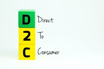 colored cubes with the letters D2C or DIRECT TO CONSUMER