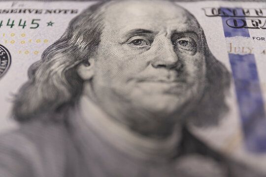 Benjamin Franklin Shallow Depth Of Field Close-up Of A One Hundred Dollar Bill For Background.