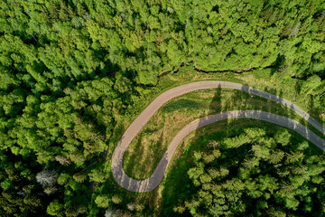 Sharp turn on forest track, roller ski track in wilderness