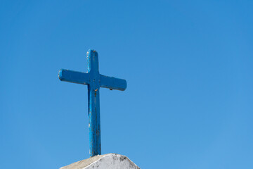 Cross of the Church of Nossa Senhora da Nazar&eacute; located in Saquarema, Rio de Janeiro. Sunny day with blue sky in the background