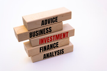INVESTMENT Conceptual Words - concept text on wooden blocks