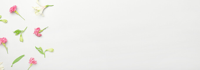 Many beautiful flowers on light background with space for text