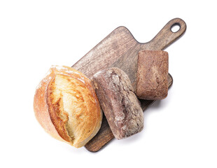 Board with different fresh bread on white background
