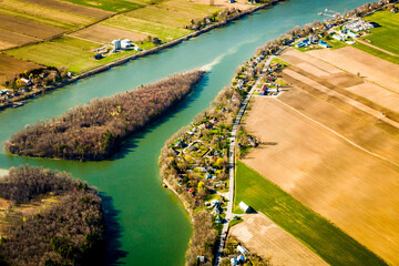 Scenic landscape with aerial view of agricultural fields in springtime, Quebec, Canada