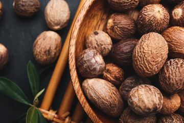 Bowl of shea nuts on table, closeup