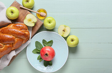 Honey with fruits and challah on color wooden background. Rosh hashanah (Jewish New Year)...