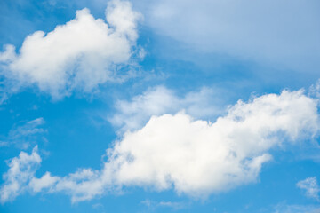 Naklejka na ściany i meble Blue sky and clouds background on daytime