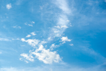 Naklejka na ściany i meble Blue sky and clouds background on daytime