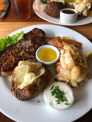 grilled steak with vegetables and lobster