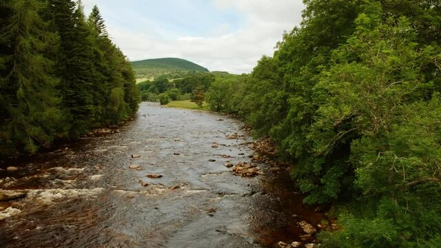 Wide view of river Dee in the Royal Deeside, Aberdeenshire, Scotland, England, UK, a region made famous by Queen Victoria