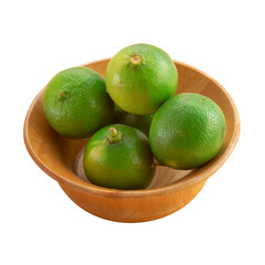 green lemon in wooden cup on white background