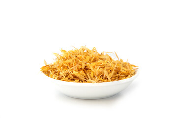 Calendula petals in a small dish on a white background