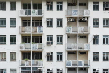 Fototapeta na wymiar Exterior of abandoned residential building in Hong Kong city
