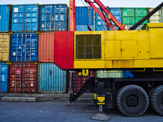 a mobile crane parking near the container zone