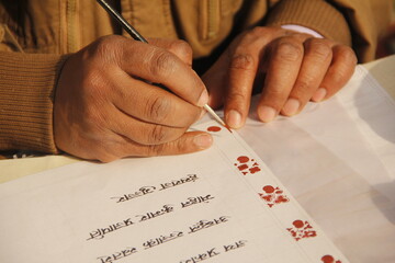 hands of a person with a book
