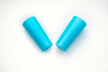 Blue plastic cup isolated on white background