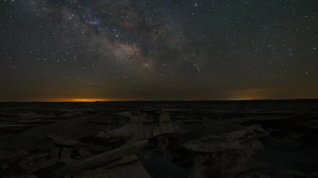 Time lapse of Milky Way galaxy over King of Wings in Bisti Wilderness in New Mexico