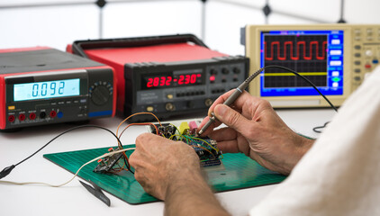 Computer motherboard repair in customer service laboratory workshop