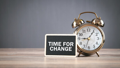 Time for change message with alarm clock.
