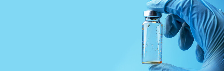 A gloved hand holds an empty medical bottle. Place under the text.